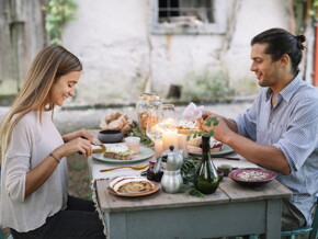 A couple eating breakfast with nutrition for fertility.
