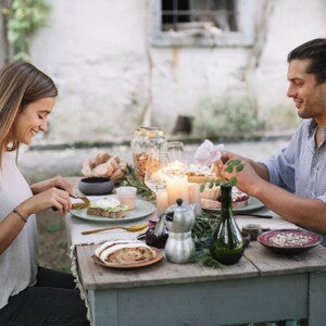 It is important to understand the role of nutrition for fertility. A couple eating breakfast with nutrition for fertility.