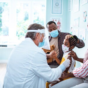 Vaccines and immunization are the first protection against diseases. A little girl getting her vaccines and immunization.