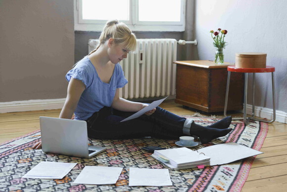 A mother working from home during maternity leave Return-to-Work transition.